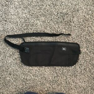 REI. Back travel pouch. Elastic strap. Like new.